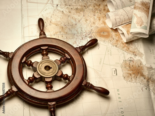Photo: Navigation maps and helm Navigation maps and helm
