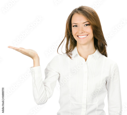 Photo: Business woman showing, isolated Business woman showing, isolated