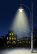 snow falls in the city at night