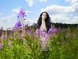 Beautiful lady in a flower meadow Beautiful lady in a flower meadow