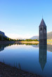 Resia lake with tower