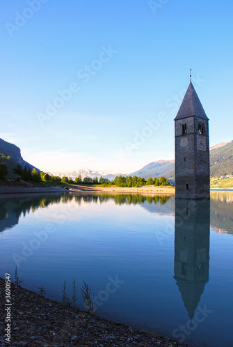 Photo: Resia lake with tower Resia lake with tower