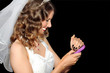 Photo: Beautiful Bride Checking her Mobile Phone Beautiful Bride Checking her Mobile Phone