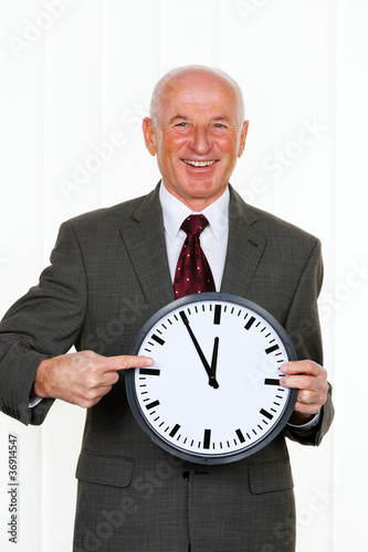 Photo: Manager mit Uhr 5 vor 12 Manager mit Uhr 5 vor 12