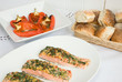 Poached salmon with roasted peppers and bread rolls Poached salmon with roasted peppers and bread rolls