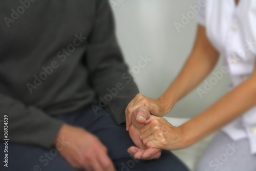 Photo: Therapist comforting patient - soft blur Therapist comforting patient - soft blur