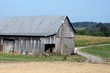 Old barn with winding country road