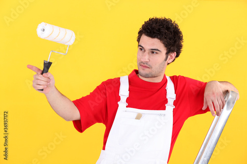 Photo: painter on a ladder painter on a ladder