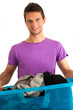 Young man doing the laundry