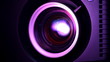 Front view of digital  film projector lens in action.