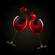 Two glasses of red wine with splash over black background