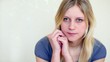 Video: Girl sits with head propped by hands and stares Girl sits with head propped by hands and stares
