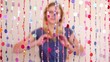 Video: Girl sit behind beads curtain, blurred Girl sit behind beads curtain, blurred