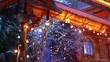 Garland on branches of artificial birch and under wooden roof
