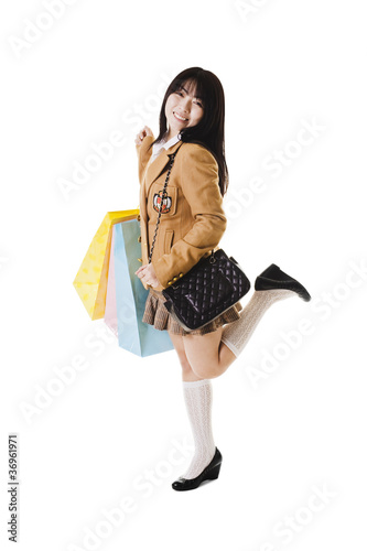 Photo: Chinese school girl shopping. Chinese school girl shopping.