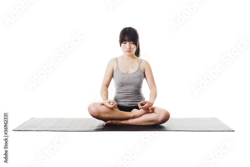 Photo: Chinese woman doing yoga. Chinese woman doing yoga.