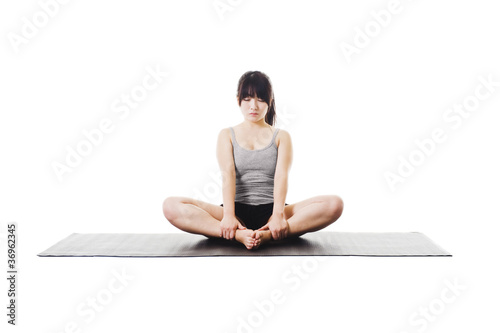 Photo: Chinese woman doing yoga. Chinese woman doing yoga.