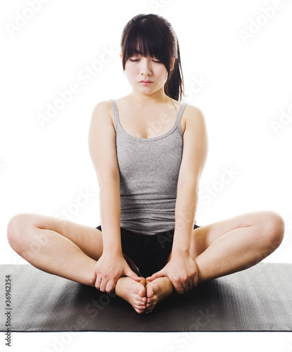 Photo: Chinese woman doing yoga. Chinese woman doing yoga.