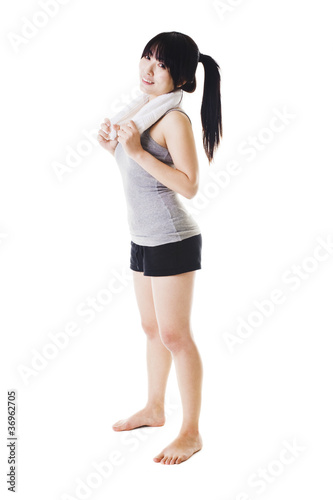 Photo: Chinese girl lifting hand weights. Chinese girl lifting hand weights.
