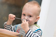 Hungry toddler eating