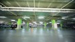 Breakdown truck passes inside parking garage