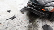 smashed car after accident on road with tram