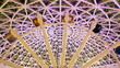 ferris wheel with flashing lights under arch of roof ferris wheel with flashing lights under arch of roof