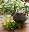 japanese teapot and green herbal tea