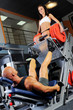 man and a woman in the gym