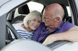 retired couple in a car