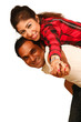 Smiling young Indian man piggybacking his pretty Wife