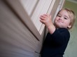 Adorable baby boy making funny face