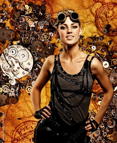 Photo: Steampunk girl over grunge background Steampunk girl over grunge background