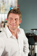 Foto: Coffeeshop - Barista in seinem Café Coffeeshop - Barista in seinem Café