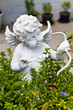 Statue of Cupid in garden