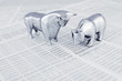 Stock market report with bull and bear