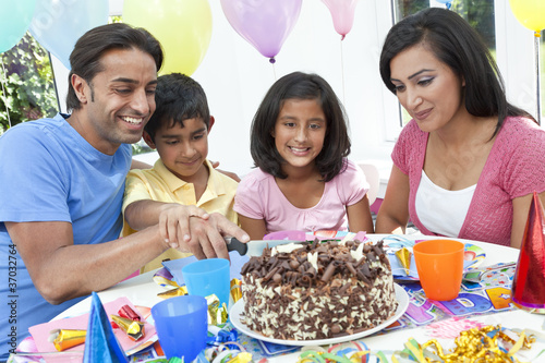 Photo: Asian Indian Family Celebrating Birthday Party Cutting the Cake Asian Indian Family Celebrating Birthday Party Cutting the Cake