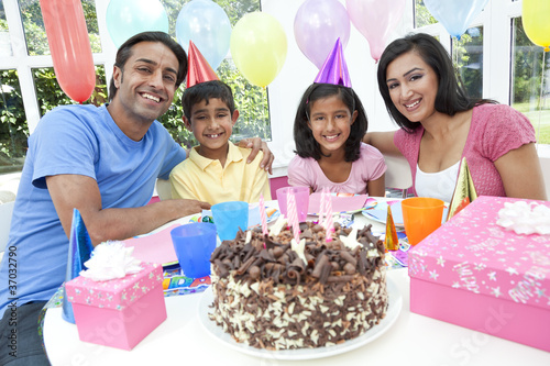 Photo: Asian Indian Family Celebrating Birthday Party WIth Chocolate Ca Asian Indian Family Celebrating Birthday Party WIth Chocolate Ca