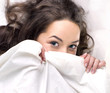 girl sleeping on the white linen