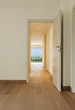 new apartment, empty corridor, open doors