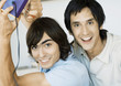 Two young men playing video games