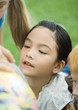 Children looking at globe together