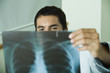Doctor studying x-ray