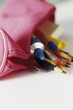 Colored pencils spilling out of pencil case