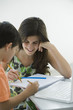 Tutor helping elementary school student