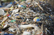 Globe in midst of landfill trash