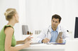 Female patient speaking with doctor