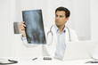Doctor studying x-ray