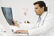 Doctor studying x-ray