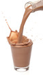 Bottle pouring milk chocolate into a glass Bottle pouring milk chocolate into a glass